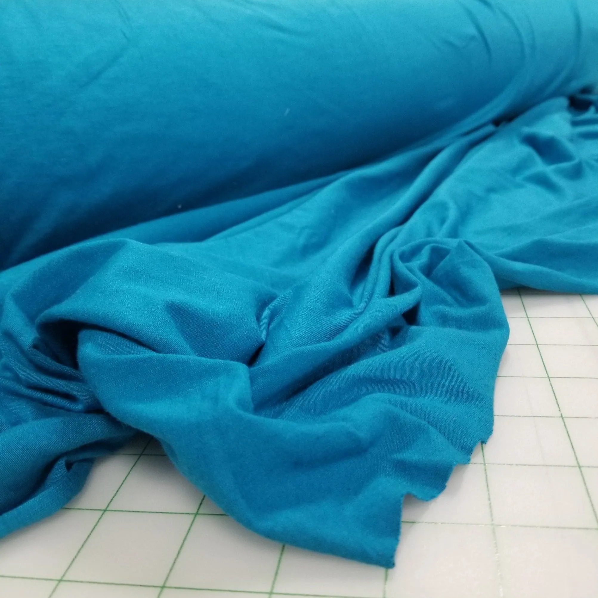 Designer Deadstock Rayon Wool  Stretch Jersey Turquoise Blue 5.5oz Knit- Sold by the yard