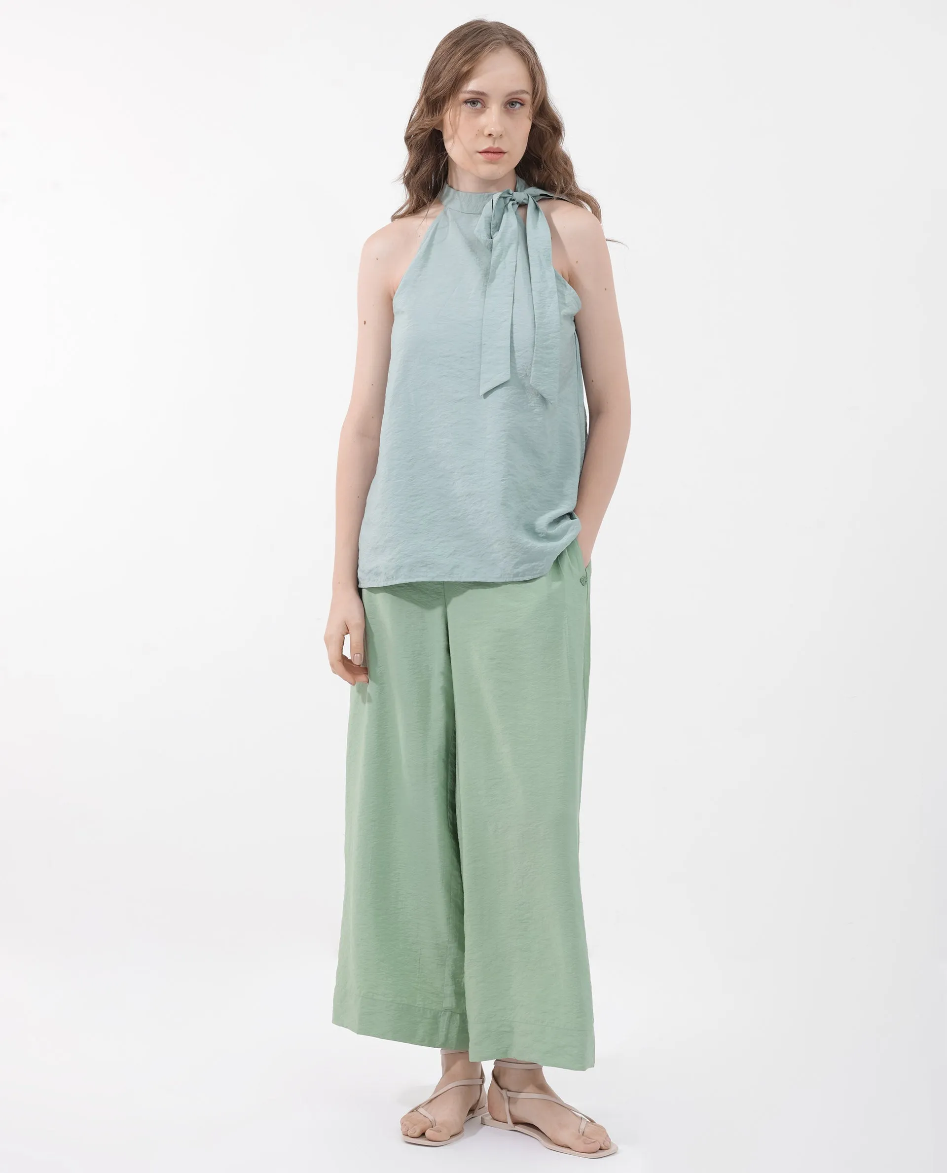 Rareism Women Millinia Pastel Green Viscose Nylon Fabric Button Closure Straight Fit Plain Ankle Length Trousers